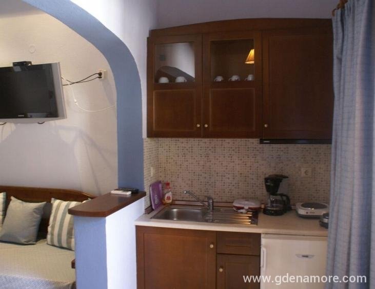 xenonas-nostos-rooms-ammouliani-athos-5-bed-apartm
