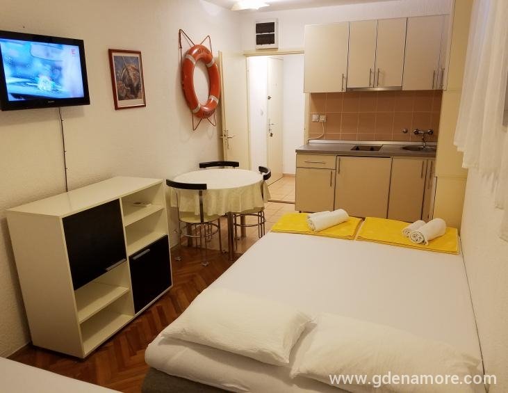 005 Apartman - Kompas
