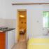 Apartmani Lilić, Apartman sa terasom/3, privatni smeštaj u mestu Donji Štoj, Crna Gora - Kuhinja sa dodatnim lezajem