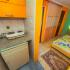 Apartmani Lilić, Apartman u prizemlju/5, privatni smeštaj u mestu Donji Štoj, Crna Gora - Kuhinja i Spavaća soba